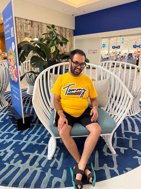 Kushal-Solanki-sitting-outside-shopping-center